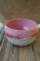 Preview: Handgefertigte Keramikbecher – rosa mit rot weißem melange Farbspiel